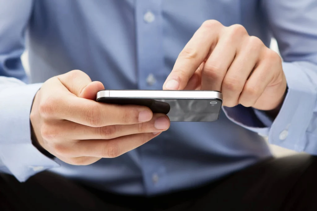 man using apps with programmatic advertising platforms