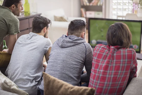 people watching footbal ads promoted by programmatic advertising