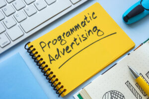 notepad with the phrase programmatic advertising
