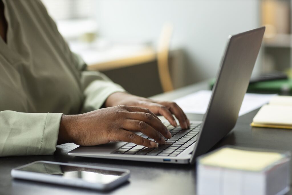 person using computer and analyzing programmatic audience segments