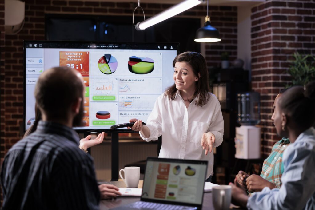 woman in meeting discussing programmatic audience segments